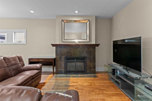 1428 2A Street Nw, Calgary, AB - Indoor Photo Showing Living Room With Fireplace