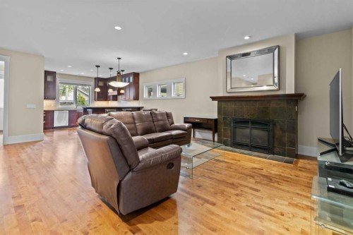 1428 2A Street Nw, Calgary, AB - Indoor Photo Showing Living Room With Fireplace