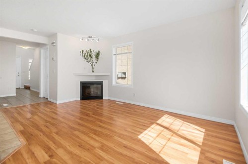108 Hidden Creek Rise Nw, Calgary, AB - Indoor Photo Showing Living Room With Fireplace