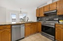 108 Hidden Creek Rise Nw, Calgary, AB  - Indoor Photo Showing Kitchen With Double Sink 