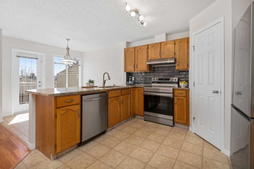 108 Hidden Creek Rise Nw, Calgary, AB - Indoor Photo Showing Kitchen