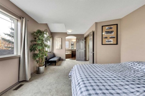943 Bayside Drive Sw, Airdrie, AB - Indoor Photo Showing Bedroom