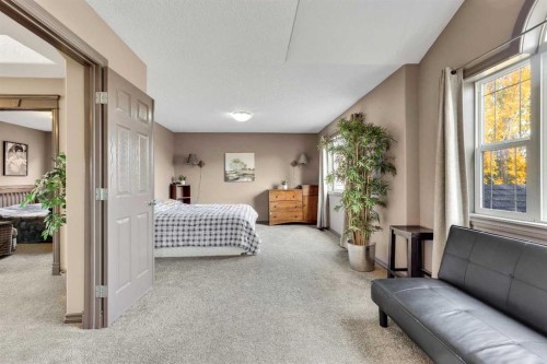943 Bayside Drive Sw, Airdrie, AB - Indoor Photo Showing Bedroom