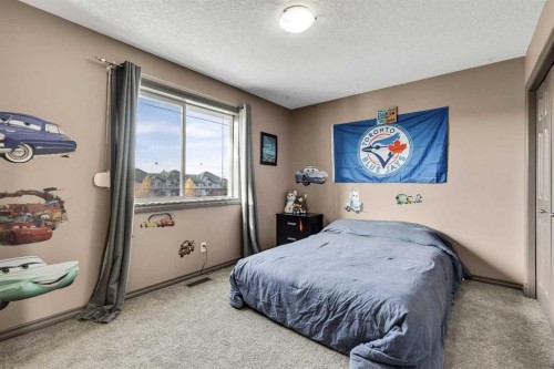 943 Bayside Drive Sw, Airdrie, AB - Indoor Photo Showing Bedroom