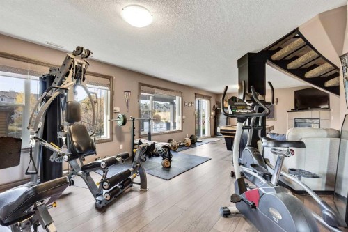 943 Bayside Drive Sw, Airdrie, AB - Indoor Photo Showing Gym Room