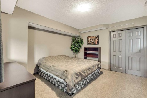 943 Bayside Drive Sw, Airdrie, AB - Indoor Photo Showing Bedroom
