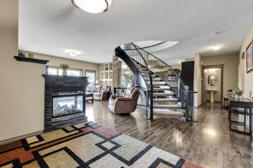 943 Bayside Drive Sw, Airdrie, AB - Indoor With Fireplace