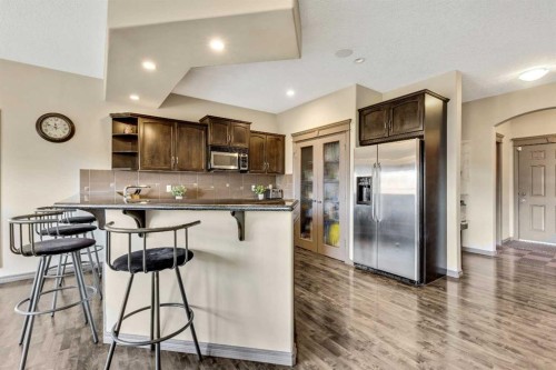 943 Bayside Drive Sw, Airdrie, AB - Indoor Photo Showing Kitchen With Upgraded Kitchen