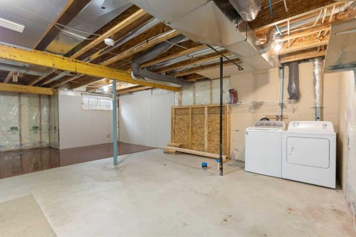 221 Prestwick Terrace Se, Calgary, AB - Indoor Photo Showing Laundry Room