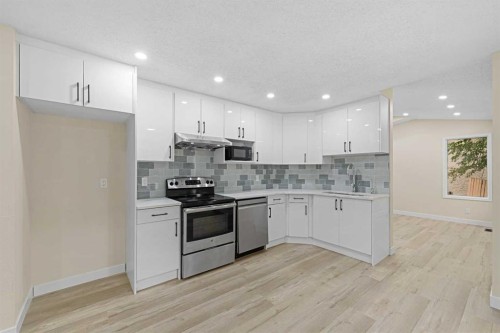 148 Harvest Wood Way Ne, Calgary, AB - Indoor Photo Showing Kitchen With Stainless Steel Kitchen
