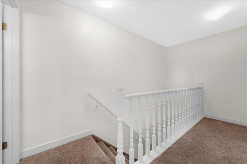 61 Falmere Way Ne, Calgary, AB - Indoor Photo Showing Other Room