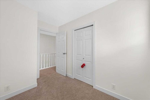 61 Falmere Way Ne, Calgary, AB - Indoor Photo Showing Other Room