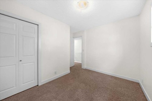 61 Falmere Way Ne, Calgary, AB - Indoor Photo Showing Other Room