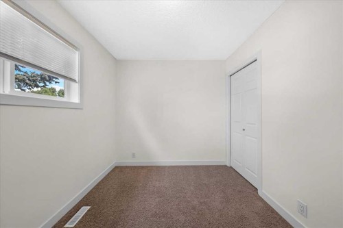 61 Falmere Way Ne, Calgary, AB - Indoor Photo Showing Other Room