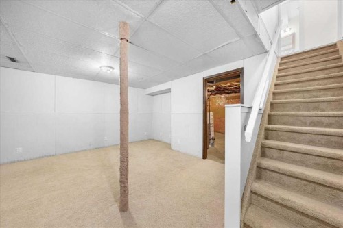 61 Falmere Way Ne, Calgary, AB - Indoor Photo Showing Other Room