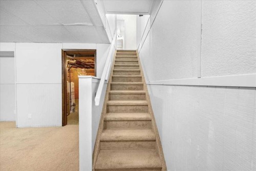 61 Falmere Way Ne, Calgary, AB - Indoor Photo Showing Other Room