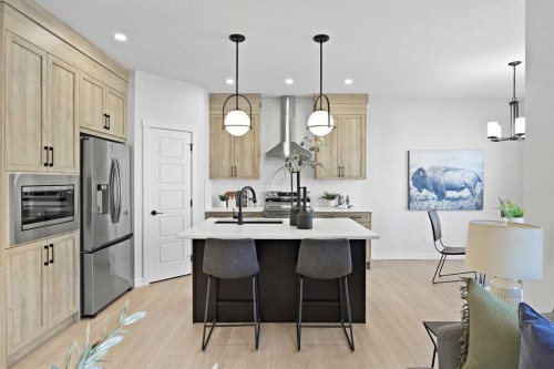 64 Fireside Common, Cochrane, AB - Indoor Photo Showing Kitchen With Upgraded Kitchen