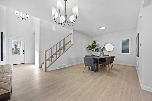 64 Fireside Common, Cochrane, AB - Indoor Photo Showing Dining Room