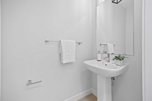 64 Fireside Common, Cochrane, AB - Indoor Photo Showing Bathroom