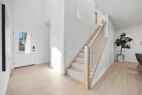 64 Fireside Common, Cochrane, AB - Indoor Photo Showing Other Room