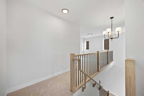 64 Fireside Common, Cochrane, AB - Indoor Photo Showing Other Room