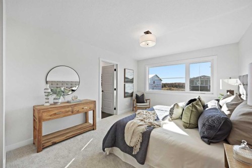 64 Fireside Common, Cochrane, AB - Indoor Photo Showing Bedroom