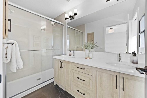 64 Fireside Common, Cochrane, AB - Indoor Photo Showing Bathroom