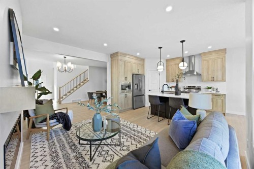 64 Fireside Common, Cochrane, AB - Indoor Photo Showing Living Room