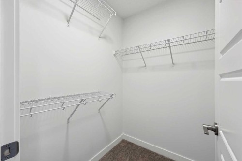 351 Fireside Drive, Cochrane, AB - Indoor With Storage