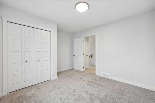 351 Fireside Drive, Cochrane, AB - Indoor Photo Showing Other Room