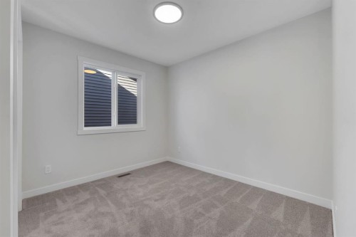 351 Fireside Drive, Cochrane, AB - Indoor Photo Showing Other Room