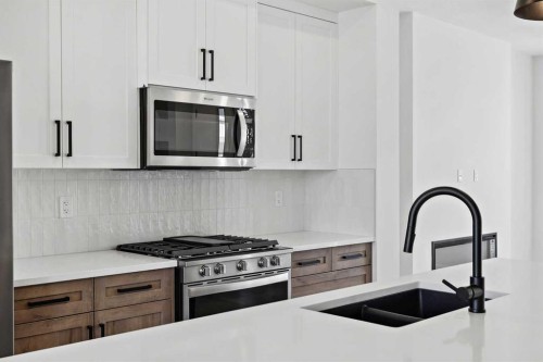 414 River Avenue, Cochrane, AB - Indoor Photo Showing Kitchen With Stainless Steel Kitchen With Double Sink With Upgraded Kitchen