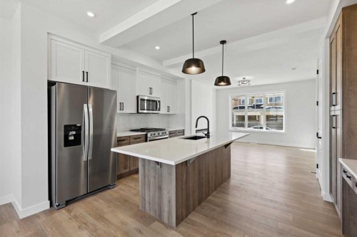 414 River Avenue, Cochrane, AB - Indoor Photo Showing Kitchen With Stainless Steel Kitchen With Upgraded Kitchen