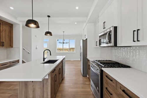414 River Avenue, Cochrane, AB - Indoor Photo Showing Kitchen With Upgraded Kitchen