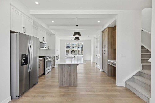 414 River Avenue, Cochrane, AB - Indoor Photo Showing Kitchen With Stainless Steel Kitchen