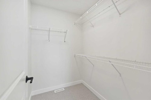 414 River Avenue, Cochrane, AB - Indoor With Storage