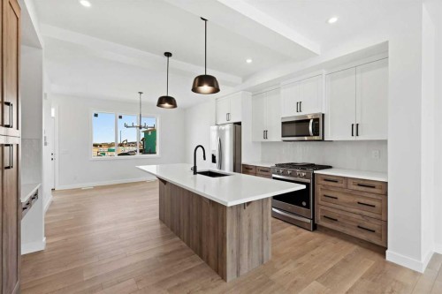 414 River Avenue, Cochrane, AB - Indoor Photo Showing Kitchen With Stainless Steel Kitchen With Upgraded Kitchen