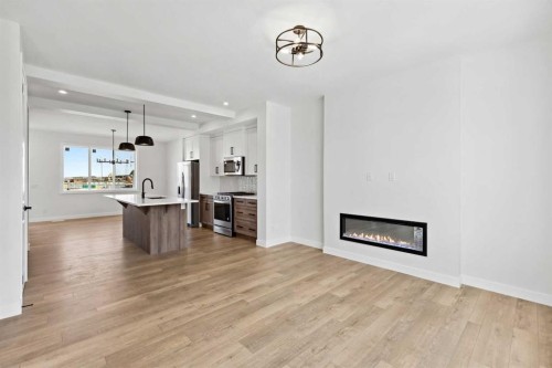 414 River Avenue, Cochrane, AB - Indoor Photo Showing Living Room With Fireplace