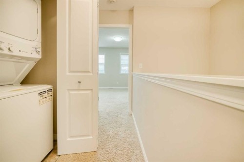 37 Panton View Nw, Calgary, AB - Indoor Photo Showing Laundry Room