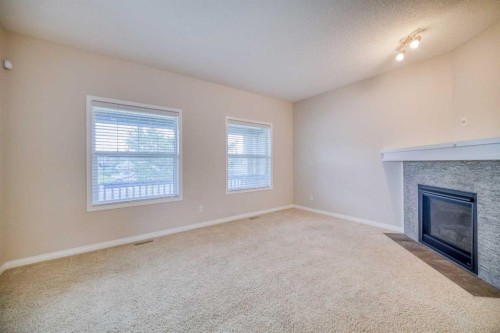 37 Panton View Nw, Calgary, AB - Indoor With Fireplace