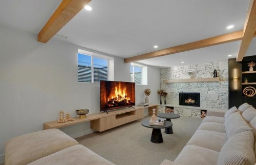 611 Parkridge Drive Se, Calgary, AB - Indoor Photo Showing Living Room With Fireplace
