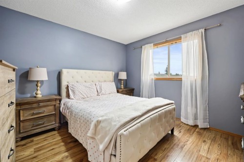 10 Big Springs Hill Se, Airdrie, AB - Indoor Photo Showing Bedroom