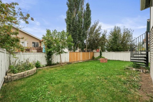 10 Big Springs Hill Se, Airdrie, AB - Outdoor With Backyard