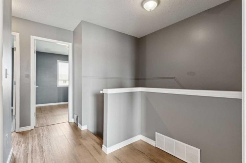 104-2001 Luxstone Boulevard Sw, Airdrie, AB - Indoor Photo Showing Other Room