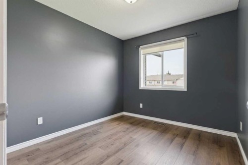 104-2001 Luxstone Boulevard Sw, Airdrie, AB - Indoor Photo Showing Other Room