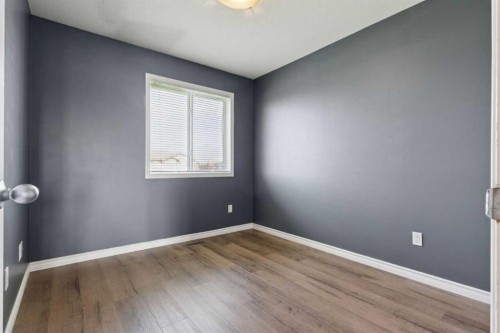 104-2001 Luxstone Boulevard Sw, Airdrie, AB - Indoor Photo Showing Other Room