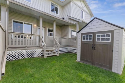 104-2001 Luxstone Boulevard Sw, Airdrie, AB - Outdoor With Deck Patio Veranda