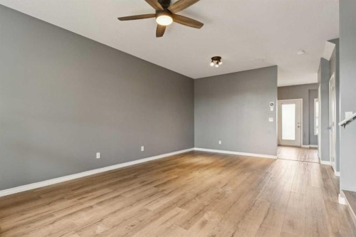 104-2001 Luxstone Boulevard Sw, Airdrie, AB - Indoor Photo Showing Other Room