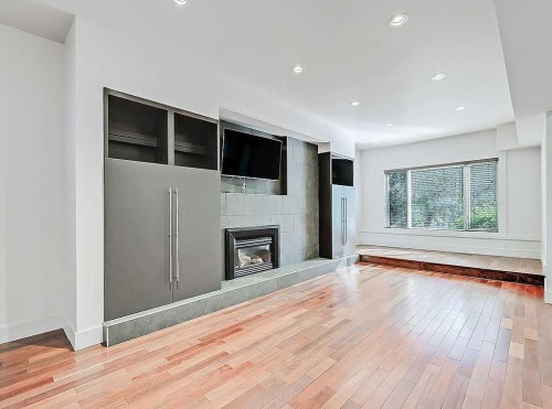 2109 14A Street Sw, Calgary, AB - Indoor Photo Showing Living Room With Fireplace