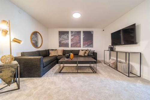 203 Lucas Common Nw, Calgary, AB - Indoor Photo Showing Living Room